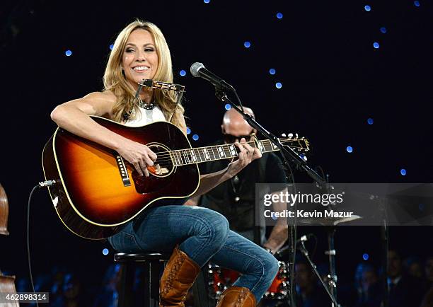 Sheryl Crow performs onstage at the 25th anniversary MusiCares 2015 Person Of The Year Gala honoring Bob Dylan at the Los Angeles Convention Center...