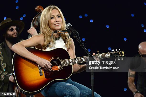 Sheryl Crow performs onstage at the 25th anniversary MusiCares 2015 Person Of The Year Gala honoring Bob Dylan at the Los Angeles Convention Center...