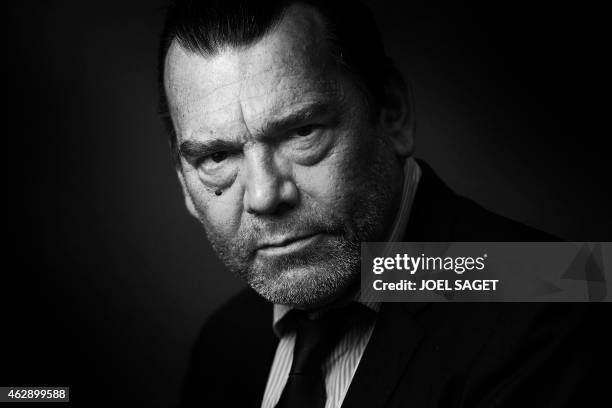 French lawyer Frank Berton poses in a photo studio in Paris on February 3, 2015 in Paris. Version black & white AFP PHOTO JOEL SAGET