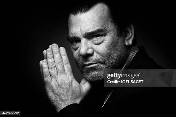 French lawyer Frank Berton poses in a photo studio in Paris on February 3, 2015 in Paris. Version black & white AFP PHOTO JOEL SAGET