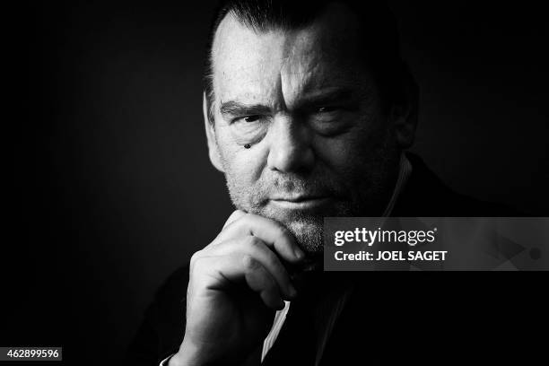 French lawyer Frank Berton poses in a photo studio in Paris on February 3, 2015 in Paris. Version black & white AFP PHOTO JOEL SAGET