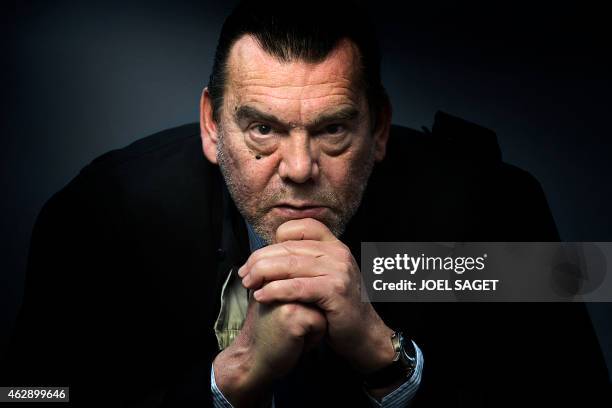 French lawyer Frank Berton poses in a photo studio in Paris on February 3, 2015 in Paris. AFP PHOTO JOEL SAGET