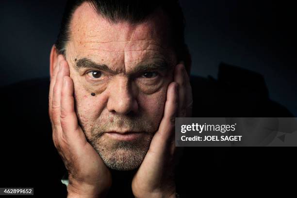 French lawyer Frank Berton poses in a photo studio in Paris on February 3, 2015 in Paris. AFP PHOTO JOEL SAGET