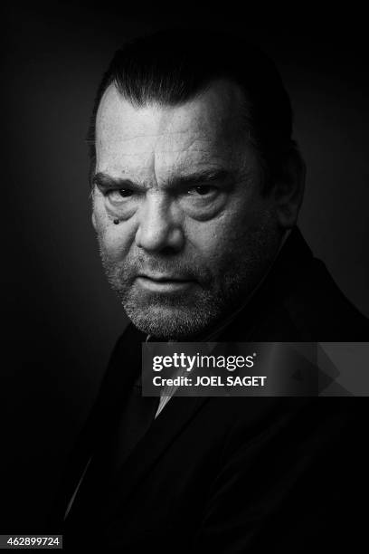 French lawyer Frank Berton poses in a photo studio in Paris on February 3, 2015 in Paris. Version black & white AFP PHOTO JOEL SAGET