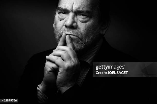 French lawyer Frank Berton poses in a photo studio in Paris on February 3, 2015 in Paris. Version black & white AFP PHOTO JOEL SAGET