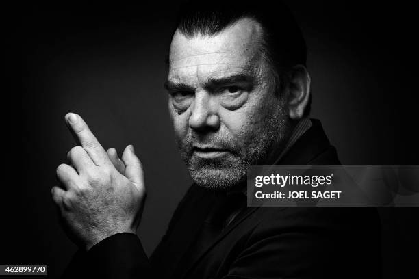 French lawyer Frank Berton poses in a photo studio in Paris on February 3, 2015 in Paris. Version black & white AFP PHOTO JOEL SAGET