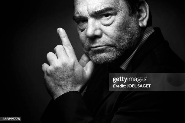 French lawyer Frank Berton poses in a photo studio in Paris on February 3, 2015 in Paris. Version black & white AFP PHOTO JOEL SAGET