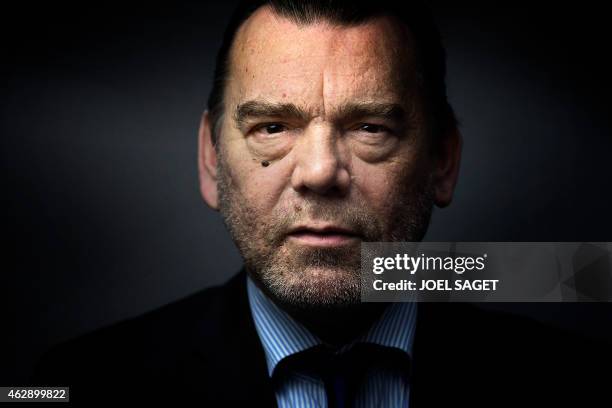 French lawyer Frank Berton poses in a photo studio in Paris on February 3, 2015 in Paris. AFP PHOTO JOEL SAGET