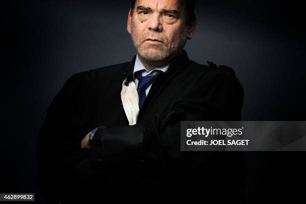 French lawyer Frank Berton poses in a photo studio in Paris on February 3, 2015 in Paris. AFP PHOTO JOEL SAGET