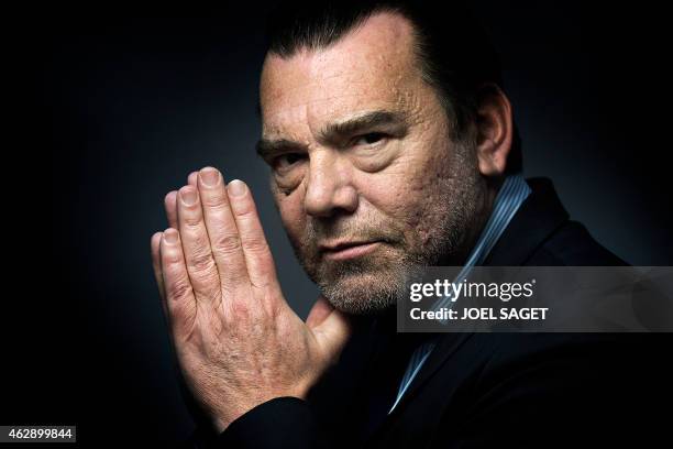 French lawyer Frank Berton poses in a photo studio in Paris on February 3, 2015 in Paris. AFP PHOTO JOEL SAGET