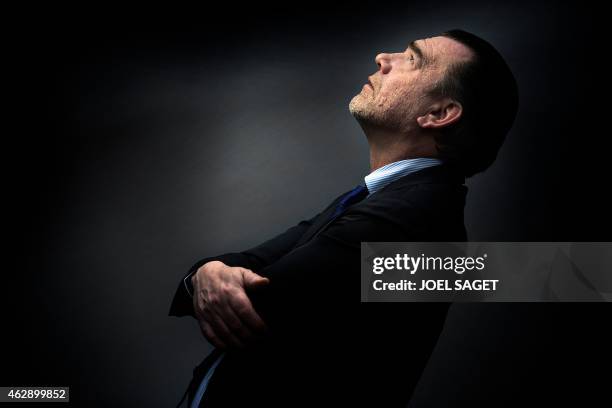 French lawyer Frank Berton poses in a photo studio in Paris on February 3, 2015 in Paris. AFP PHOTO JOEL SAGET