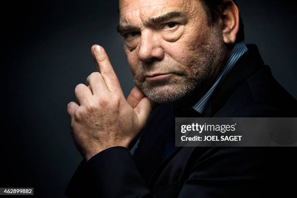 French lawyer Frank Berton poses in a photo studio in Paris on February 3, 2015 in Paris. AFP PHOTO JOEL SAGET