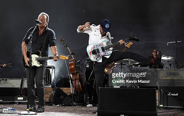 Bruce Springsteen, Don Was and Tom Morello perform onstage at the 25th anniversary MusiCares 2015 Person Of The Year Gala honoring Bob Dylan at the...