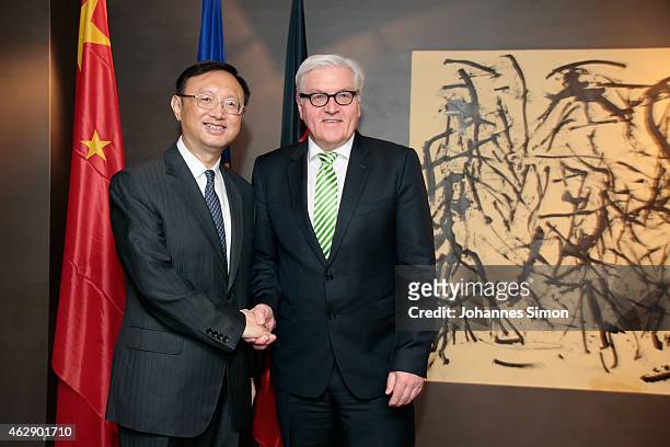 Frank-Walter Steinmeier , German minister of foreign affairs and Yang Jiechi, state councilor of the People's Republic of China shake hands ahead of...