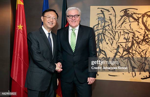 Frank-Walter Steinmeier , German minister of foreign affairs and Yang Jiechi, state councilor of the People's Republic of China shake hands ahead of...