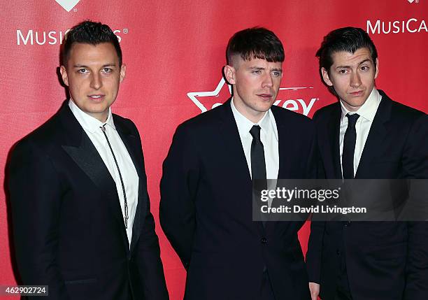 Musicians Matt Helders, Jamie Cook, and Alex Turner of Arctic Monkeys attend the 2015 MusiCares Person of the Year Gala honoring Bob Dylan at the Los...