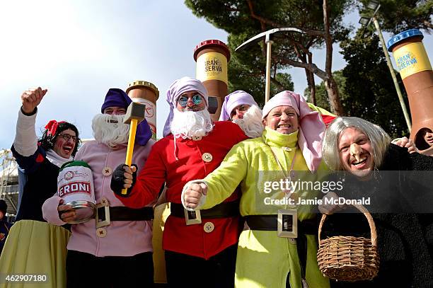 Fans dressed as characters from "Snow White and the Seven Dwarves" arrive at the stadium prior to kickoff during the RBS Six Nations match between...