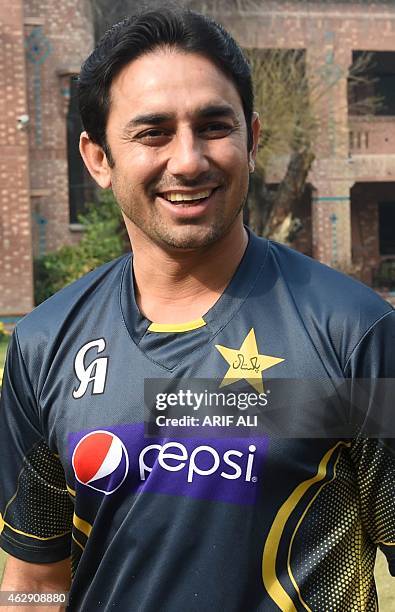 Pakistan spinner Saeed Ajmal arrives to speak to media at the National Cricket Academy in Lahore on February 7, 2015. The bowling actions of...