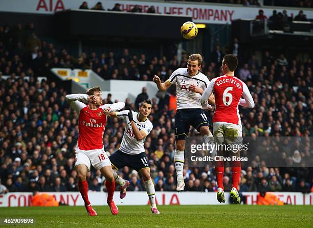 Harry Kane of Tottenham Hotspur heads the winning goal during the Barclays Premier League match between Tottenham Hotspur and Arsenal at White Hart...