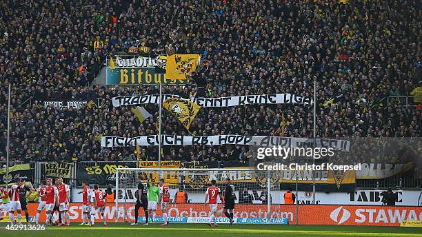 Fans of Aachen show banner during the Regionalliga West match between Alemannia Aachen and Rot-Weiss Essen at Tivoli Stadium on February 7, 2015 in...