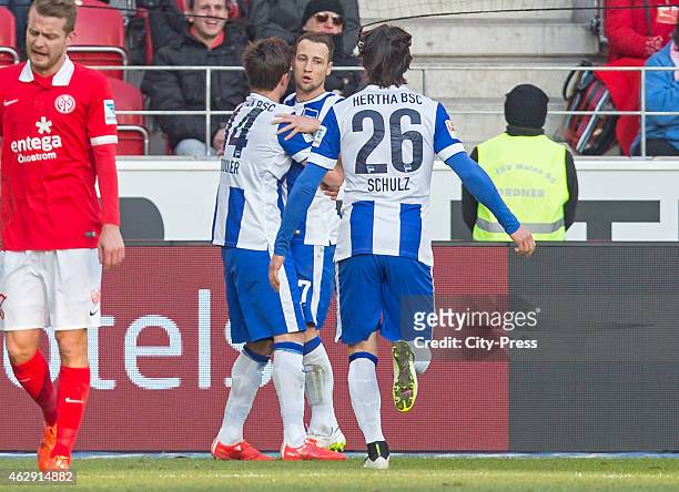 Valentin Stocker, Roy Beerens and Nico Schulz of Hertha BSC celebrate after scoring the 0:2 during the game between FSV Mainz and Hertha BSC on...