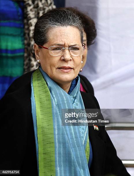 Congress president Sonia Gandhi along with Kiran Walia arrive to cast their vote at polling booth during the Delhi Assembly Elections 2015, on...