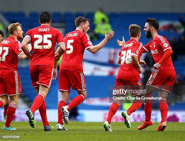 Forest's Danny Collins celebrates after scoring the teams first goal of the game during the Sky Bet Championship match between Brighton & Hove Albion...