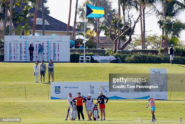 Ai Miyazato of Japan hits a tee shot on the third hole during round two of the Pure Silk Bahamas LPGA Classic at the Ocean Club course on February 7,...