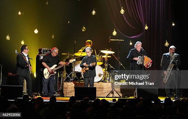 Cesar Rosas, Conrad Russel Lozano and and Louis Perez of Los Lobos perform onstage during the 2015 MusiCares Person of The Year honoring Bob Dylan...