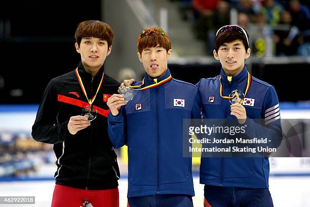 Gold medalist Sin Da-Woon of Korea , Silver medalist Park Seyeong of Korea and Bronze medalist Chen Dequan of China pose for a picture after winning...