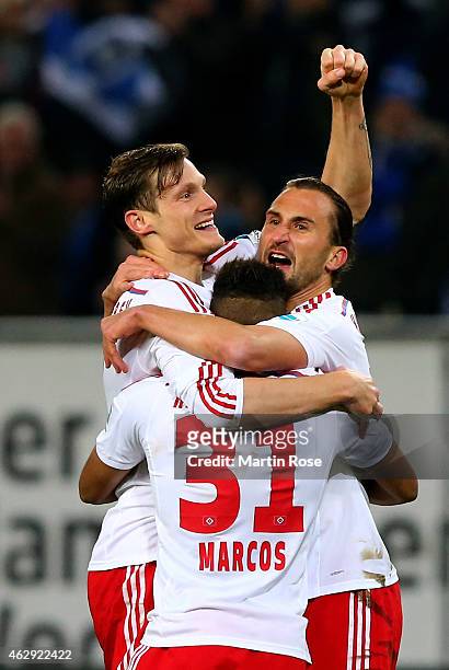Marcell Jansen of Hamburg celebrate with his team mates after he scores the 2nd goal during the Bundesliga match between Hamburger SV and Hannover 96...