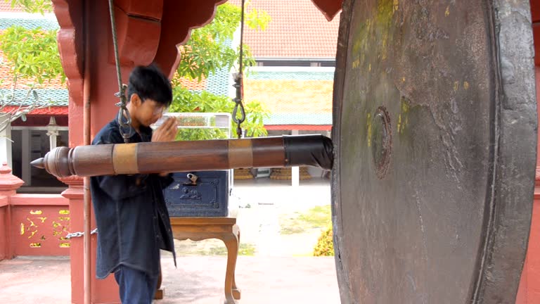 Man Ringing Gong 219 Striking Gong Stock Videos, Footage, & 4K Video Clips - Getty Images