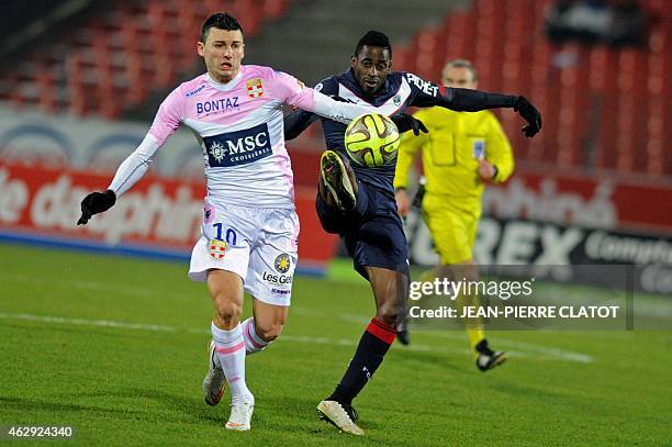 Evian's French forward Mathieu Duhamel vies for the ball with Bordeaux's Gabonese midfielder Andre Biyogo Poko during the French L1 football match...