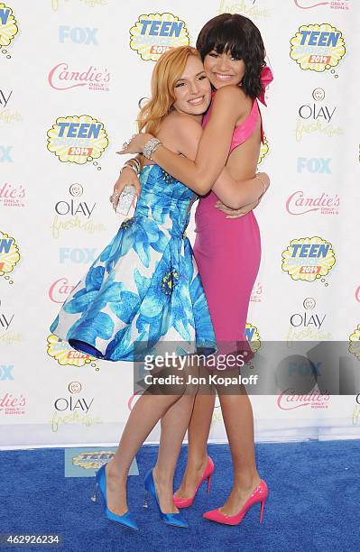 Actress Bella Thorne and actress Zendaya arrive at the 2014 Teen Choice Awards at The Shrine Auditorium on August 10, 2014 in Los Angeles, California.