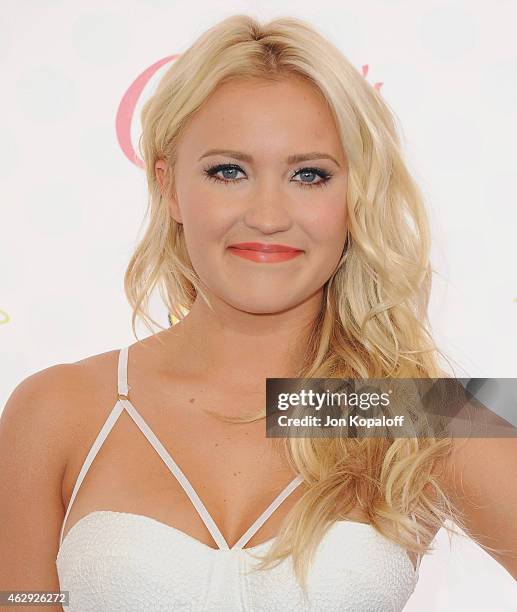 Actress Emily Osment arrives at the 2014 Teen Choice Awards at The Shrine Auditorium on August 10, 2014 in Los Angeles, California.