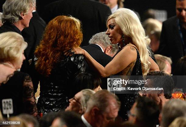 Musician Bonnie Raitt and singer Lady Gaga in the audience at the 25th anniversary MusiCares 2015 Person Of The Year Gala honoring Bob Dylan at the...