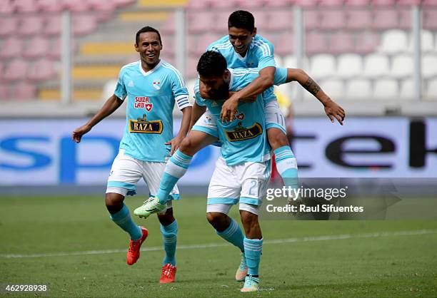 Josepmir Ballon of Sporting Cristal celebrates with his teammates after scoring the second goal of his team against Deportivo Municipal during a...