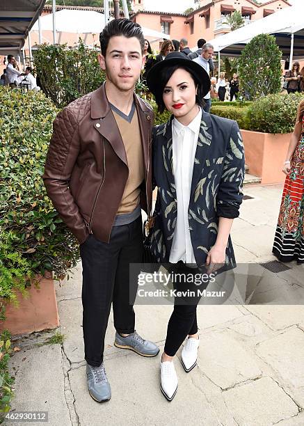 Nick Jonas and Demi Lovato attend the Roc Nation and Three Six Zero Pre-GRAMMY Brunch at Private Residence on February 7, 2015 in Beverly Hills,...