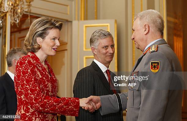 Queen Mathilde of Belgium and King Philippe greet General Werner Freers , Chief of Staff of Supreme Headquarters Allied Powers Europe during a...