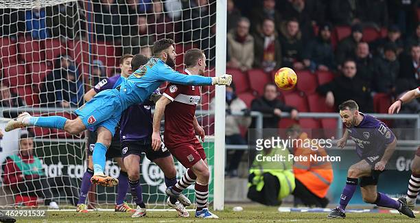 Andreas Arestidou of Morecambe attempts to punch the ball clear during the Sky bet League Two match between Northampton Town and Morecambe at...