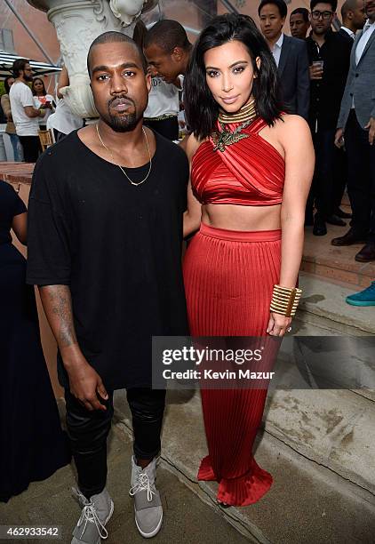 Kanye West, speculated to be wearing the Yeezy 3 sneakers "Yeezy 750 Boost", and Kim Kardashian attend the Roc Nation and Three Six Zero Pre-GRAMMY...