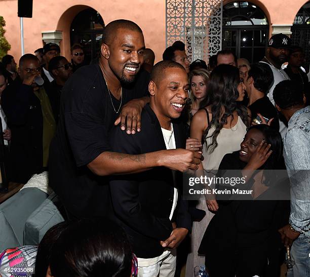 Kanye West and Jay Z attend the Roc Nation and Three Six Zero Pre-GRAMMY Brunch at Private Residence on February 7, 2015 in Beverly Hills, California.