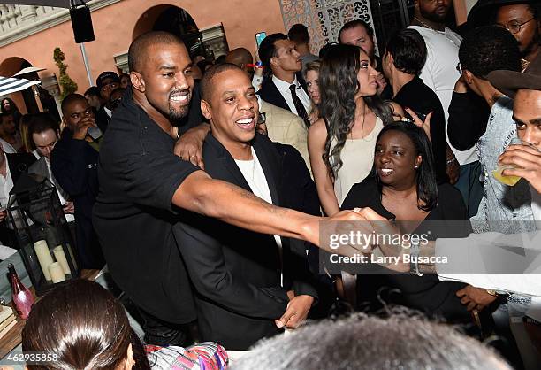 Recording artists Kanye West and Jay-Z attend Roc Nation and Three Six Zero Pre-GRAMMY Brunch 2015 at Private Residence on February 7, 2015 in...
