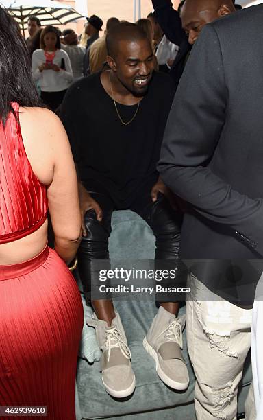 Recording artist Kanye West, speculated to be wearing the Yeezy 3 sneakers "Yeezy 750 Boost", attends Roc Nation and Three Six Zero Pre-GRAMMY Brunch...