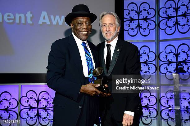 Honoree Buddy Guy and President/CEO of The Recording Academy and GRAMMY Foundation President/CEO Neil Portnow attend The 57th Annual GRAMMY Awards -...