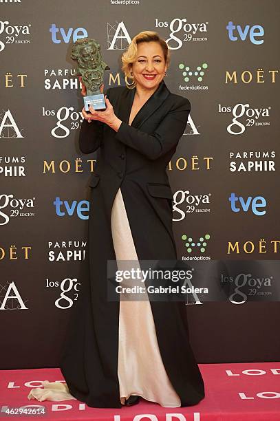 Carmen Machi holds the award for Best Actress in a Supporting Role in the film "Ocho apellidos Vascos" during the 2015 edition of the Goya Cinema...