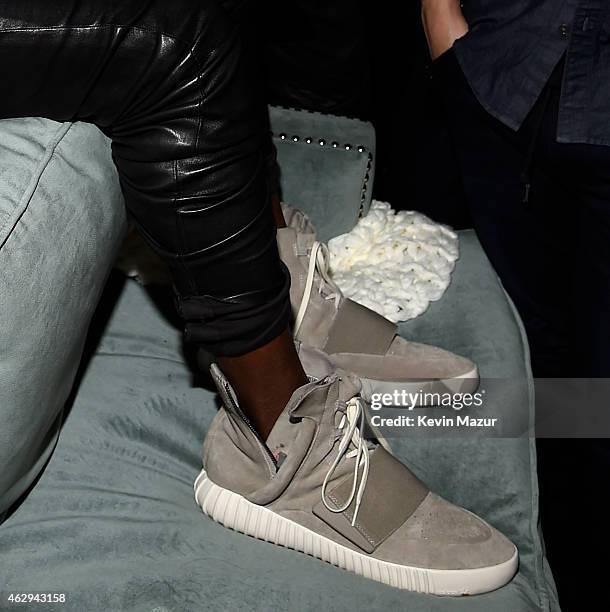 Kanye West, speculated to be wearing the Yeezy 3 sneakers "Yeezy 750 Boost", attends the Roc Nation and Three Six Zero Pre-GRAMMY Brunch at Private...