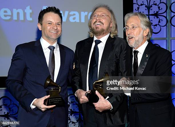 Adam Gibb, honoree Barry Gibb and President/CEO of The Recording Academy and GRAMMY Foundation President/CEO Neil Portnow attend The 57th Annual...