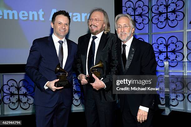 Adam Gibb, honoree Barry Gibb and President/CEO of The Recording Academy and GRAMMY Foundation President/CEO Neil Portnow attend The 57th Annual...