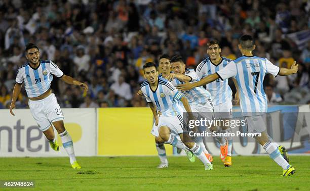 Angel Correa of Argentina celebrates with teammates after scoring the second goal of his team during a match between Argentina and Uruguay as part of...